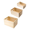 Three wooden storage boxes in light timber, varying in size, with open handles and a simple design.