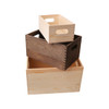 A set of three wooden storage boxes in light beige, dark brown, and natural wood finishes, featuring cut-out handles.