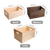 A set of three wooden storage boxes in natural and dark finishes, with varying sizes and dimensions.