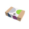 A cardboard box featuring a colourful design with overlapping circles and a logo on the front.