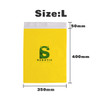 A large yellow biodegradable mailer bag with measurements displayed, featuring a logo.