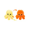 A reversible plush octopus toy features a happy yellow side and an angry orange side, showcasing vibrant colours.