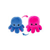 A blue and pink reversible octopus plush toy with a happy face on one side and a sad face on the other.
