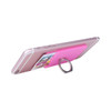 A pink Smart Wallet with a ring attached, mounted on the back of a smartphone, displaying a card slot.