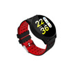 A round smart watch with a black body and a red silicone strap, featuring a digital display with various metrics.