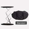 A black display counter with a collapsible frame and a carrying bag. The counter features a smooth top surface.