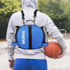 A blue ball backpack with mesh side pockets, worn on the back by a person holding a basketball. It has a logo.
