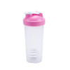 A drink bottle with a clear body and a pink lid, featuring a mixer ball inside and a logo.