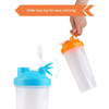 A drink bottle in clear plastic with a blue lid and orange loop top for easy carrying. Features a mixing ball inside.