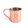A copper mug with a polished finish and a handle, featuring an engraved logo on the front.