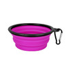 A pink collapsible silicone bowl with a black rim and a clip attachment.