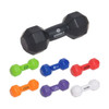 A collection of dumbbell-shaped stress relievers in various colours, including black, green, blue, red, and white, with branding.
