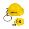 A yellow helmet-shaped stress reliever attached to a keyring, with a logo on the side.