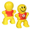 A yellow, smiling stress reliever shaped like a person, with a red shirt and a cheerful expression.