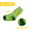 Custom pattern football socks in bright green with a towel bottom for added comfort. Features a logo.