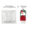 A biodegradable bag containing six pairs of coral fleece socks in green, red, and white, with an optional header card.