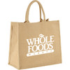 A large jute tote bag in a natural beige colour with handles and a logo on one side.