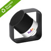 A wireless speaker made of recycled ABS and aluminium, featuring a silver and black design with a logo.
