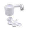 A set of white measuring scoops in various sizes, featuring a handle and a logo on one piece.