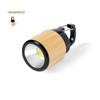 A bamboo torch with a black clip and a bright light at the front, featuring a simple and modern design.