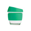A drink bottle featuring a clear glass body with a green silicone lid and sleeve, perfect for reusable coffee.