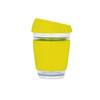 A reusable glass coffee cup in bright yellow, featuring a silicone sleeve and an angled lid, with a logo.