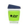A drink bottle featuring a transparent glass design with a bright green silicone sleeve and a navy lid. It has a logo.
