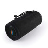 A black and textured cylindrical Bluetooth speaker with a carry strap and a logo on the front.