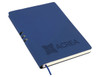A navy A5 notebook with a textured cover, featuring a logo and a matching blue ribbon bookmark.