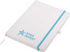 A white A5 notepad with a blue elastic band and a logo. The notepad is closed with a ribbon bookmark.