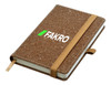 A brown bonded leather A6 notebook with an elastic band closure and a branded logo on the cover.