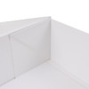 A medium foldable magnetic box in white, highlighting its corners and interior structure. It features a logo.