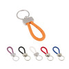 A metal keyring tag with a braided strap in orange, surrounded by keyring tags in purple, black, white, red, and blue.