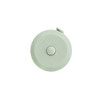 A round, light green tape measure with a white button, featuring a logo on the surface.