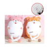Tiger-shaped 2-in-1 travel pillows in pink and orange, featuring plush bodies and soft, white limbs.