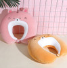 A pink and orange tiger-shaped 2-in-1 travel pillow, featuring plush textures and cute facial details.