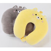 A grey and yellow cat-shaped 2-in-1 travel pillow, featuring plush textures and playful designs.