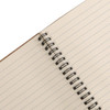 A Kraft notebook with lined pages, featuring a spiral binding. The notebook has a brown cover and an interior of cream-coloured paper.