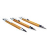 Three eco-friendly bamboo click pens with sleek silver accents. Each pen features a smooth wooden finish.