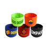 Stretchy armbands in green, red, black, and vibrant yellow, featuring various logos and designs.