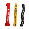 A collection of three promotional cheersticks in red, yellow, and black, featuring various logos and text.
