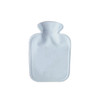 A white hot water bottle with a plush cover, featuring a smooth, rounded design. It has a small logo.