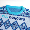 A knitted sweater featuring a blue and white jacquard pattern with a turquoise neckline and a logo.