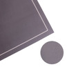 A grey diatomite floor mat featuring a subtle border design and a circular inset showing the texture.