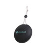 A portable, round black waterproof Bluetooth speaker with a textured surface and a hanging cord. It features a logo.