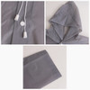 A grey reusable PEVA raincoat featuring a hood, drawstring, and cuff details. It includes a logo on the fabric.
