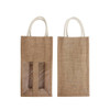 A jute double wine carrier in natural brown with a transparent window and two handles. It has a simple, rustic design.