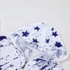 A poly-spandex 1/4 zip fishing hood shirt in white with navy blue stars and a hood. Features a logo.