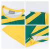A green and yellow 100% polyester sublimated sports tee shirt featuring a logo and geometric patterns.