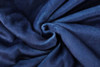 A textured, deep navy fabric showcasing a luxurious, soft polyester material suitable for blankets.